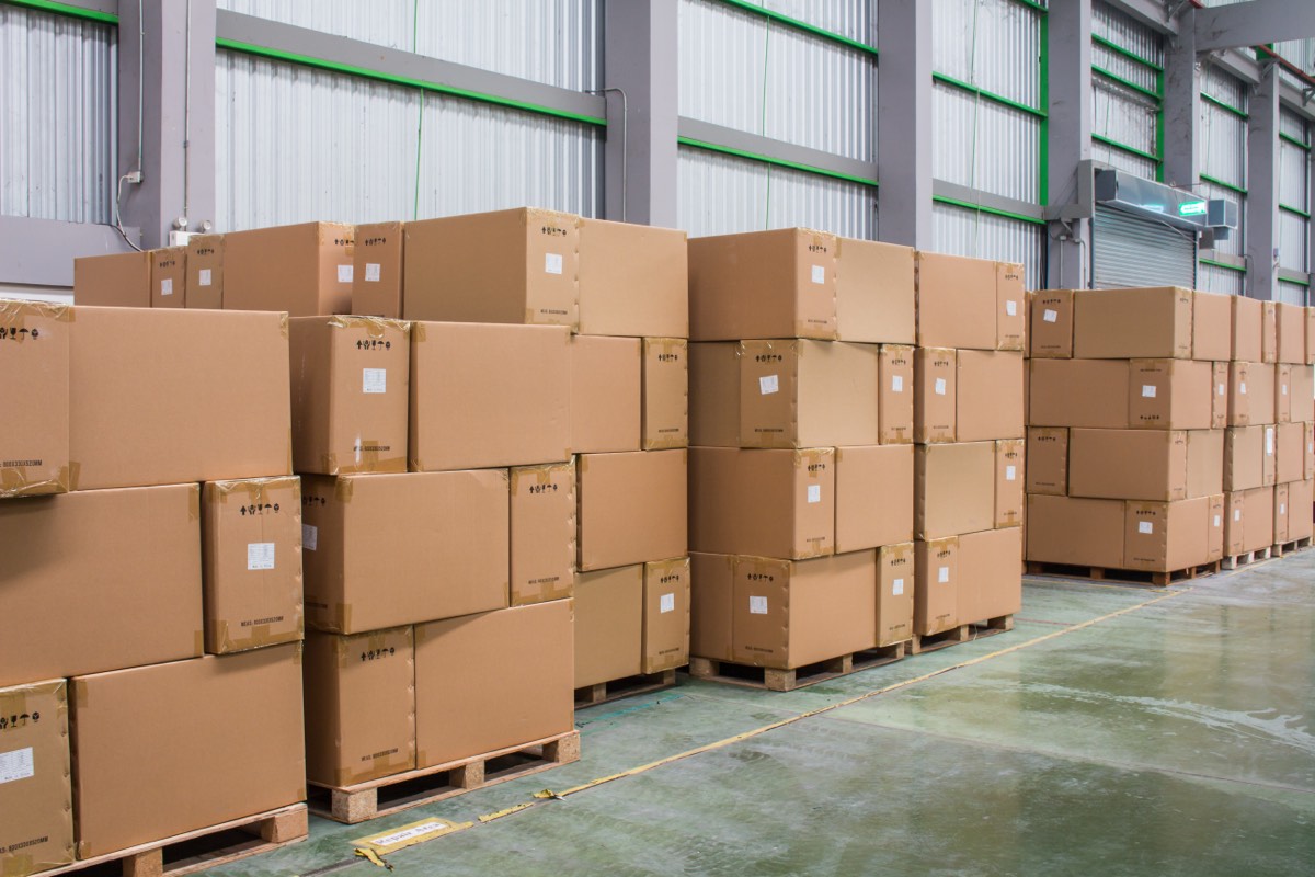 Rows of storage boxes in a large warehouse